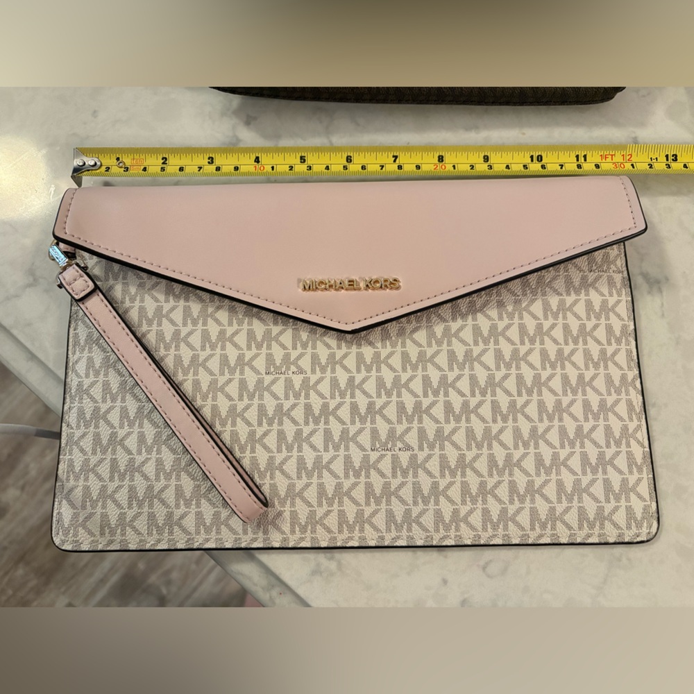 Envelope clutch/wristlet never used